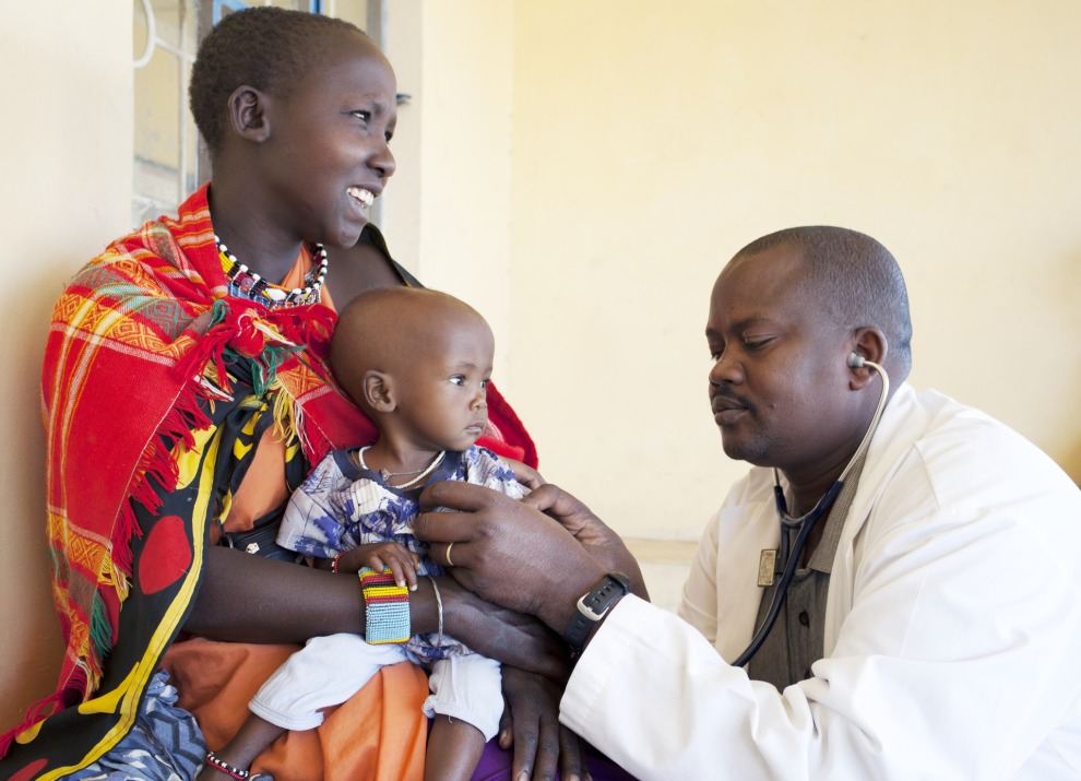 Doctor-inspecting-child