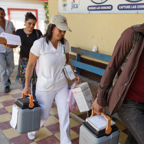 health-workers-transporting-vaccines